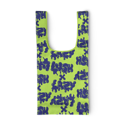 The Lush x Lazy carrier bag, a bright, light green with the Lush x Lazy Logo design on it in navy blue.