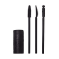 A Solid cylindrical block of black mascara next to three different style mascara spoolie brushes.