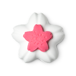 Blooming Beautiful. A flower shaped, white coloured bath bomb with a pink lid on top.