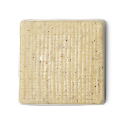 Buffy. A cream coloured, rounded square shaped, solid body butter, flecked with ground rice, almonds and aduki beans.