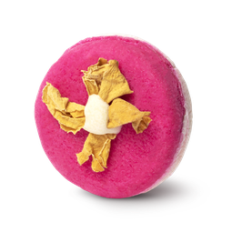 Coconut Rice Cake. A circular solid shampoo bar, with a hot pink top half and a creamy white base, topped with yellow petals.