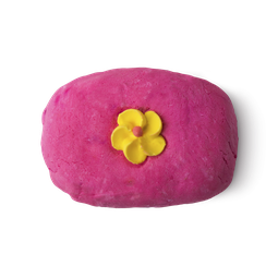 Creamy Candy. A rectangular, hot pink bubble bar with a yellow (in this instance) candy flower in its centre.