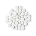 A pile of small, circular, white Dirty toothpaste tabs shot from above. 