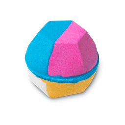 The Experimenter. A hexagonal shaped bath bomb, block coloured half pink, half blue on top, and yellow and white on its base.