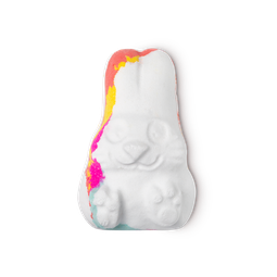 Follow The White Rabbit bath bomb, a cute white bunny with its paws up, with a thin multicoloured outline. 