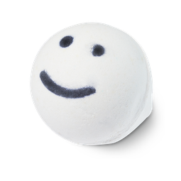 Happy Face, a white, circular-shaped bath bomb with two black dots for eyes and a black smile line.
