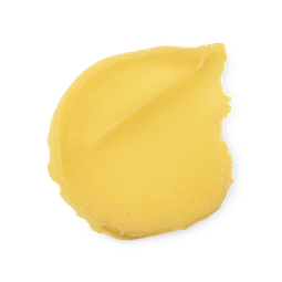 A swatch of thick, rich yellow None Of Your Beeswax lip balm.