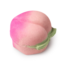 Peachy. A peach fruit-shaped bath bomb, coloured in a gradient of hot pink to peach, complete with a green leaf design.