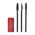A Solid cylindrical block of pink mascara next to three different style mascara spoolie brushes.