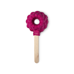 Raspberry Blower Bubble Bar. A red bumpy raspberry shape with a hole in the middle is mounted on a stick like an ice lolly.