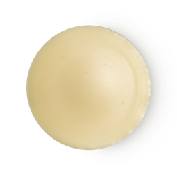 An arial view of rich cream coloured, balm-like Shade solid perfume.
