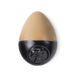 Slap Stick 23N. A medium dark-neutral, rich tan coloured, egg-shaped solid foundation, with a black wax base.