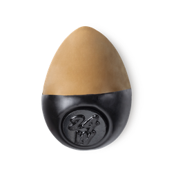 Slap Stick 24W. A medium dark-neutral, caramel brown, egg-shaped solid foundation, with a black wax base.