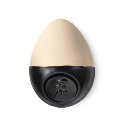 Slap Stick 2N. A light-neutral, cream-light beige coloured, egg-shaped solid foundation, with a black wax base.