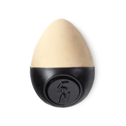 Slap Stick 5N. A light-neutral, light beige coloured, egg-shaped solid foundation, with a black wax base.