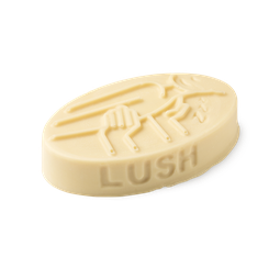Sleep. A cream coloured, oval shaped, solid massage bar, with an embossed design of a person being massaged to sleep.