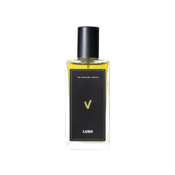 A glass perfume bottle filled with greeny-yellow liquid. A black label reads 'The Perfume Library' and 'V'.