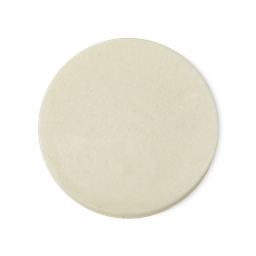 7 to 3. A circular, cream in colour, naked cleansing pad.