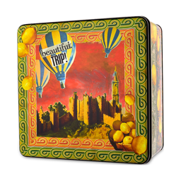 A deep, square metal tin with patterned edges. The lid has a beautiful castle at sunset scene surrounded by hot air balloons and lemons with the words "Beautiful Trip" on the top left balloon.