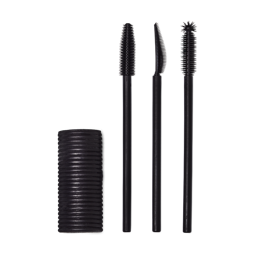 A Solid cylindrical block of black mascara next to three different style mascara spoolie brushes.