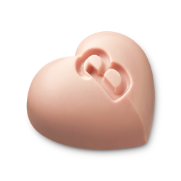 Barbie Body Balm. A full, pastel pink, heart-shaped body balm with the iconic Barbie "B" embossed in the centre