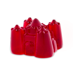 Bouncy Castle. A fun, strawberry red shower jelly in the typical sandcastle or bouncy castle shape. It has four outer turret shapes with a central dome, complete with door. 