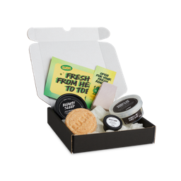 Calming. The image shows an opened Claiming Freshers box. The lid is open and it is at an angle. There are three potted products and two non-packaged products surrounded by Eco-pops with two brightly coloured paper inserts.