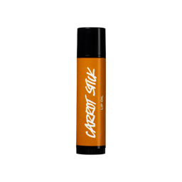 Carrot Stick, the lip oil's packaging is shown from the side. 