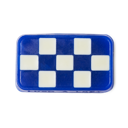 Checked In, a rectangular soap with a white and blue checkered pattern.