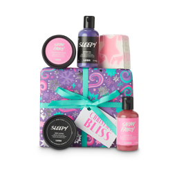 Christmas Bliss. A purple, wrapped gift box with 5 pampering products around the edge.