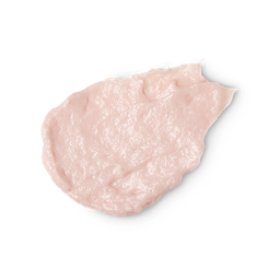 A swatch of pale pink Co-Mingle body scrub, thick with ground tagua nut and bamboo.