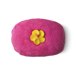 Creamy Candy. A rectangular, hot pink bubble bar with a yellow (in this instance) candy flower in its centre.