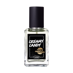 Creamy Candy. The classic LUSH glass perfume bottle with a black lid and a sticker printed with "Creamy Candy" on the front.