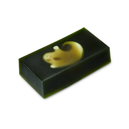 Demon in the Dark. A dark, bottle-green, rectangle soap block with a friendly, lighter, ghost shape in the middle.