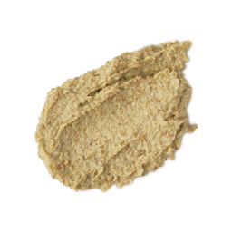 Enzynamite. A round, smudged swatch of pale, golden, creamy face mask with visible textured exfoliating pieces.