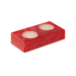 Faerie Realm. A thick, oblong slice of vivid red soap with two white circles on top.
