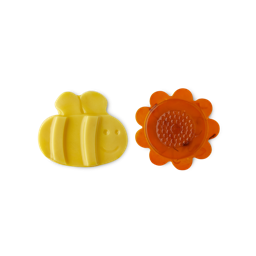 Flight of the Bumblebees. A pair of eye pads; one shaped as a bright yellow bumblebee and the other shaped as a blooming, orange flower. 