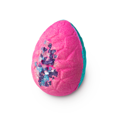 Flamingo Egg, half pink half blue egg shaped bath bomb, with coloured coarse sea salt embedded in the pink side facing camera.