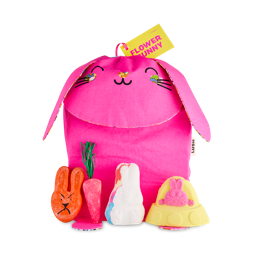 Flower Bunny. A gift consisting of a bright pink, rabbit-shaped, reusable backpack with four Easter-themed bath products laid in front. 