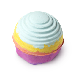 Groovy Kind of Love. A round bath bomb with ridged layers of baby blue, yellow, orange, pink and purple, creating a rainbow.