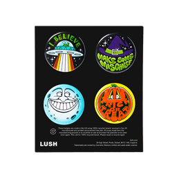 Halloween badge set. A set of four season-themed badges including a spaceship, moon face, witches hat and pumpkin.