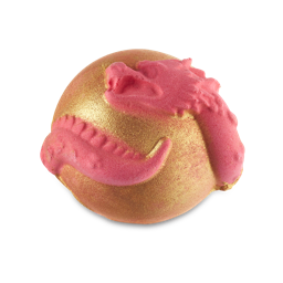 Inner Dragon. A round, golden bath bomb with a deep pink, Chinese-style dragon coiled around.