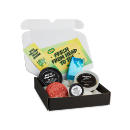 Invigorating. The image shows an opened Invigorating Freshers box. The lid is open and it is at an angle. There are three potted products and two non-packaged products surrounded by Eco-pops with two brightly coloured paper inserts.
