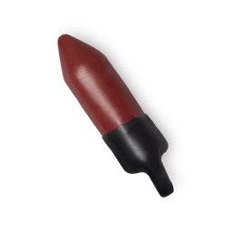 Lahore. A fiery red lipstick refill, protected by a wax outer layer, which features a tab for easy removal.