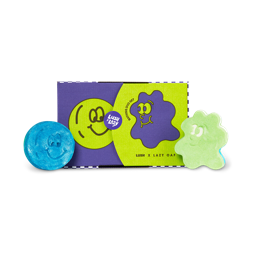 Wash Buddy bath bomb and Bubbly Buddy bubble bar sit either side of a green and purple box with the same designs.