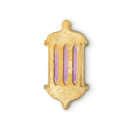 Light The Night, a bath bomb in the shape of a golden lantern, with pale purple "light" coming from within.