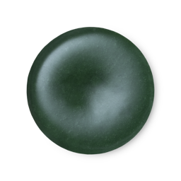 An arial view of forest green, balm-like Lord of Misrule solid perfume.