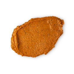 Mr Pumpkin Face. A splattered swatch of burnt-orange face mask showcasing exfoliating granules.