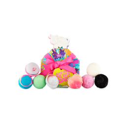 Never Mind The Bath Bombs. A colourful, paint-splatter patterned octagonal-shaped box sits wrapped in pink ribbon and a round yellow label. There are nine different, vibrantly coloured bath bombs sitting on and around the box. 