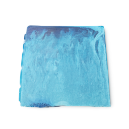 Outback Mate. A bright blue, smooth, trapezium shaped soap, with bumps along its left side and a wavy design in the mix.